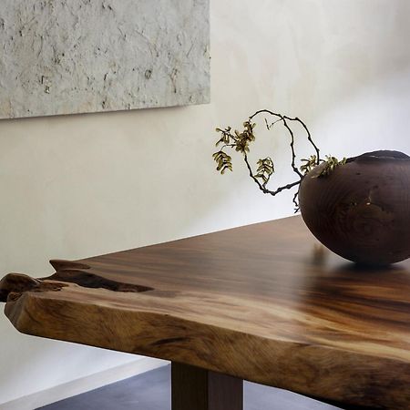 Hotel The Celestine Kyoto Gion Eksteriør billede A table made from a slab of wood