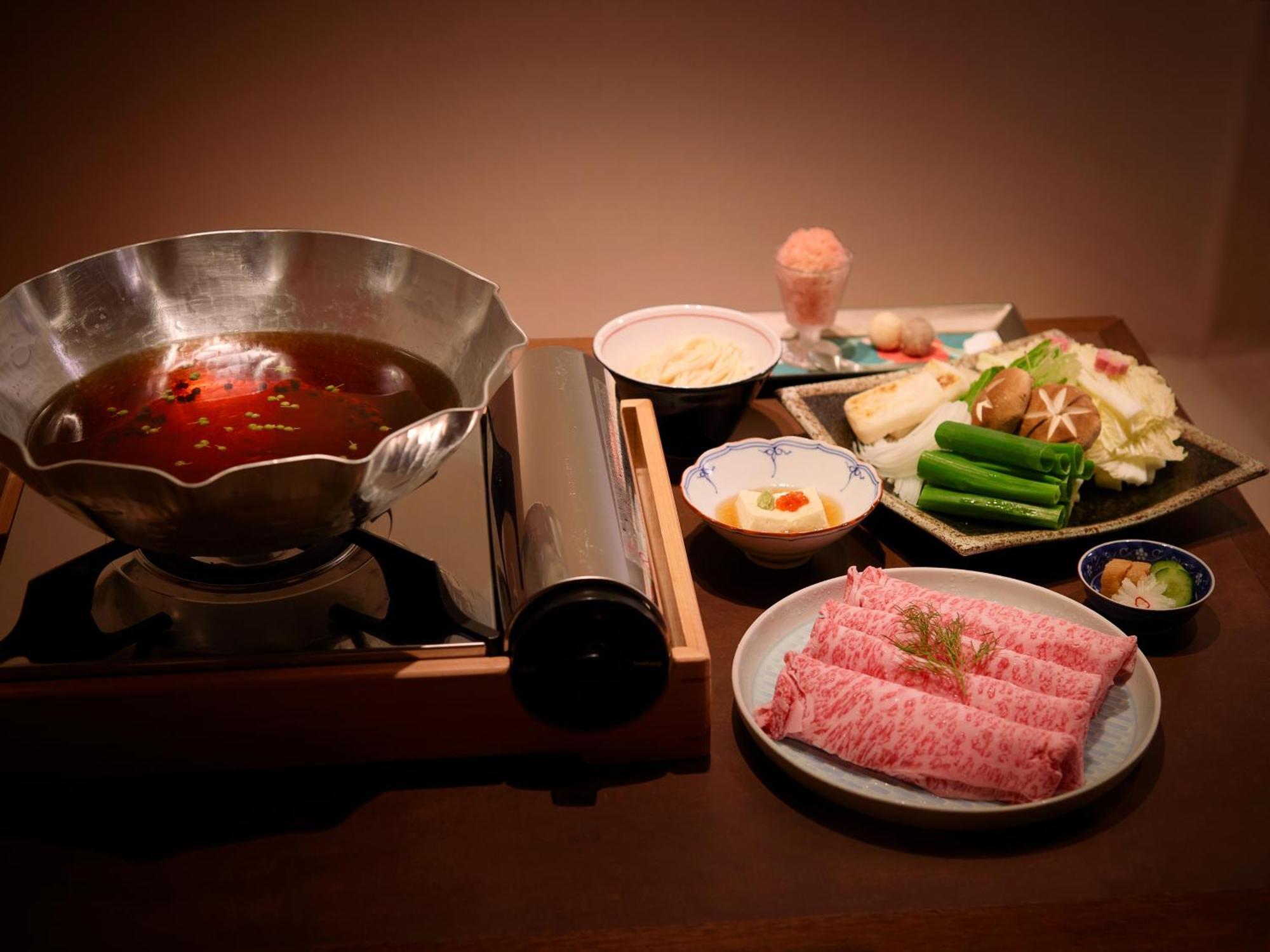 Hotel The Celestine Kyoto Gion Eksteriør billede A set of dishes prepared for a hot pot